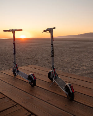 Two GOTRAX XR Ultra Electric Scooters with LG Batteries at the Beach