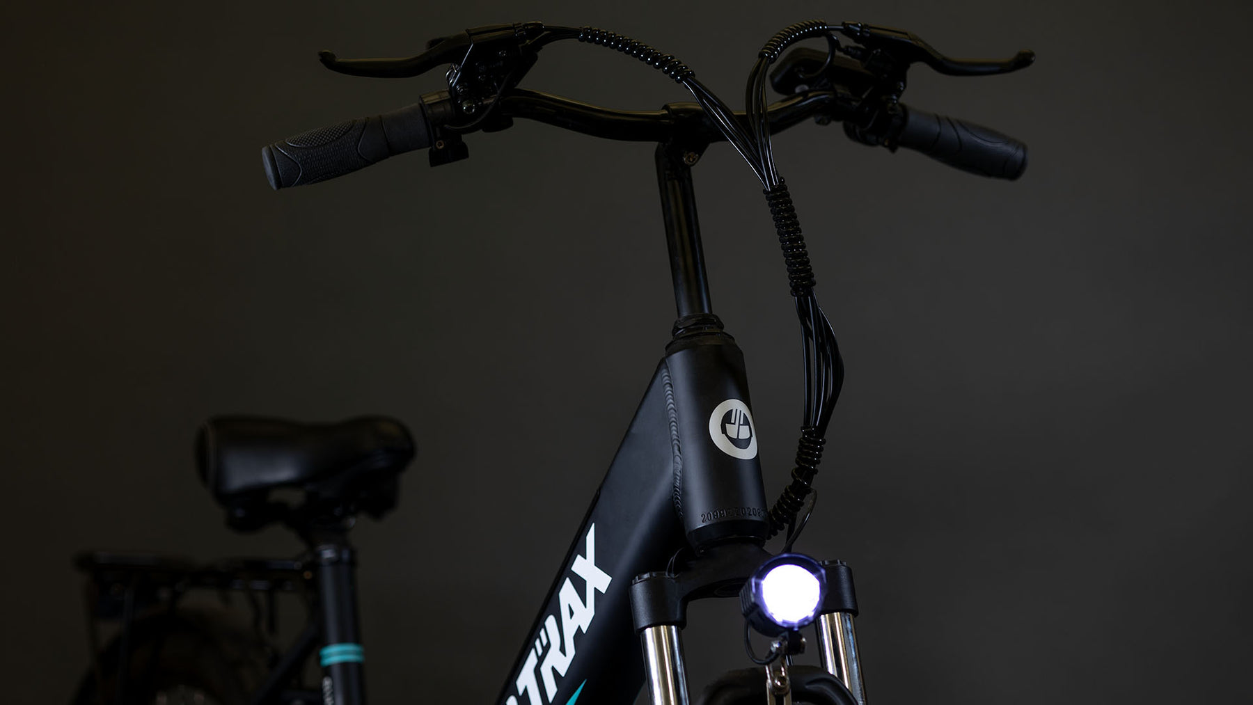GOTRAX Black Endura Step-Through Electric Bike with Front Wheel Suspension Headlight/Handlebar Close Up