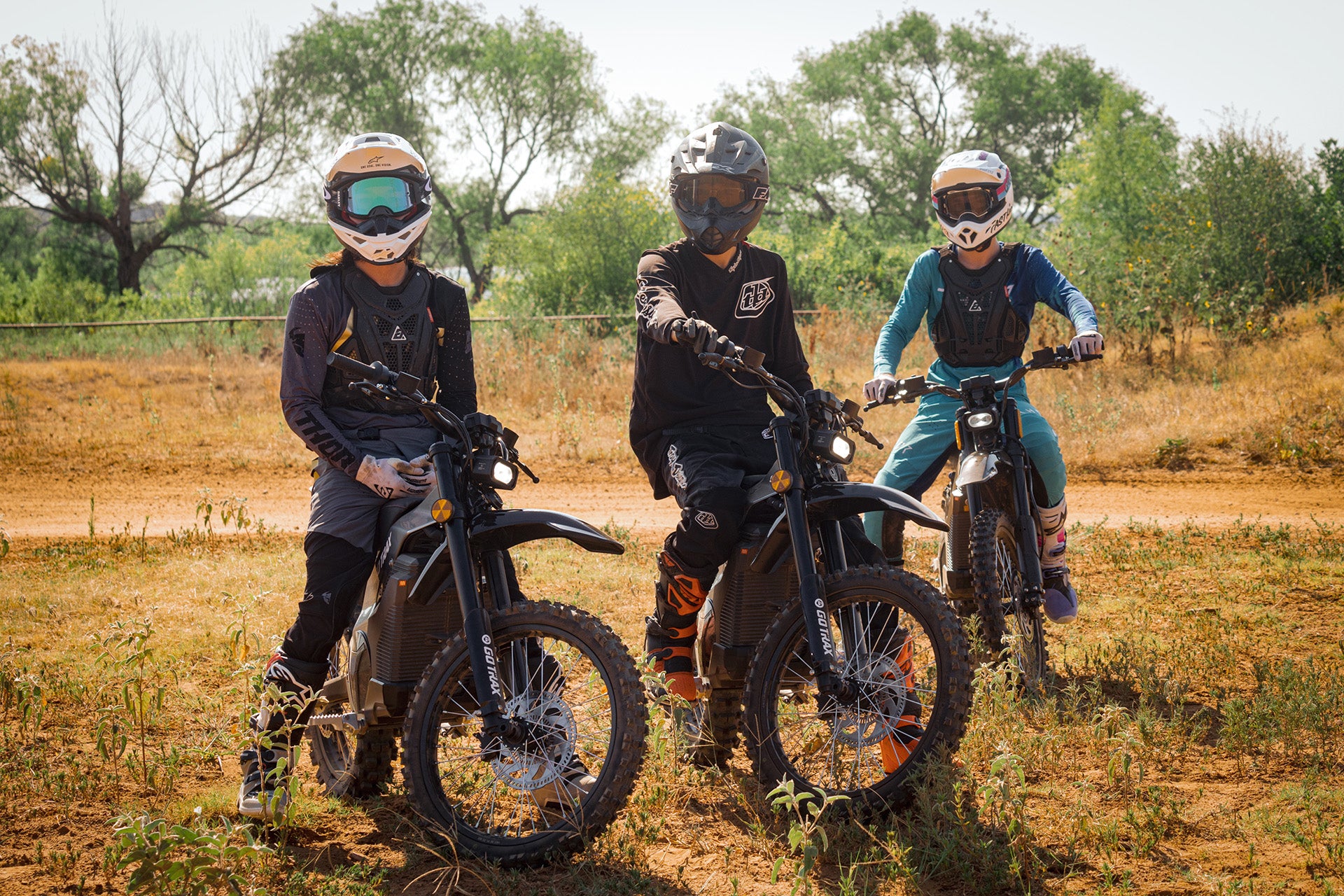 3 People on individual GOTRAX Everest Electric Dirt Bikes